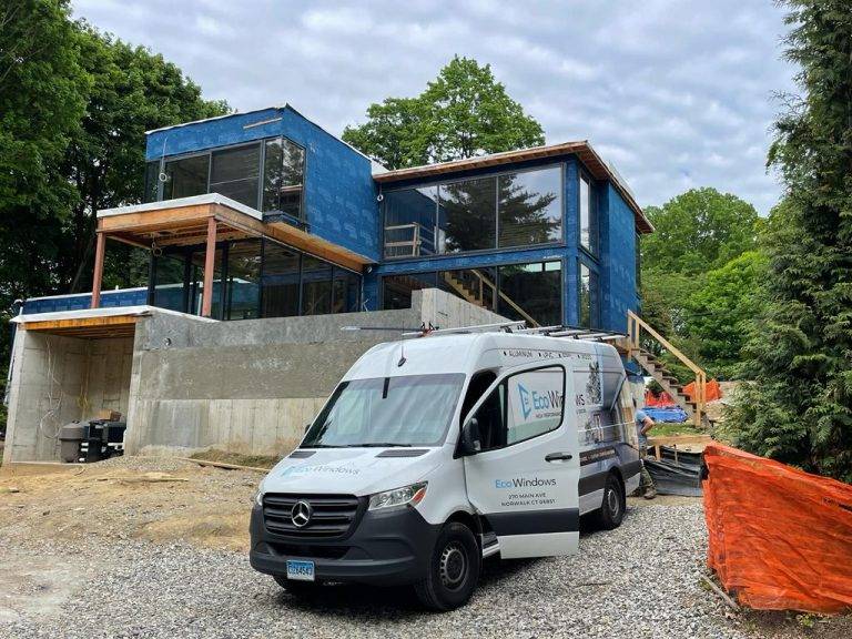 Residential installation of premium aluminum windows and modern lift & slide door systems in Scarsdale, NY.