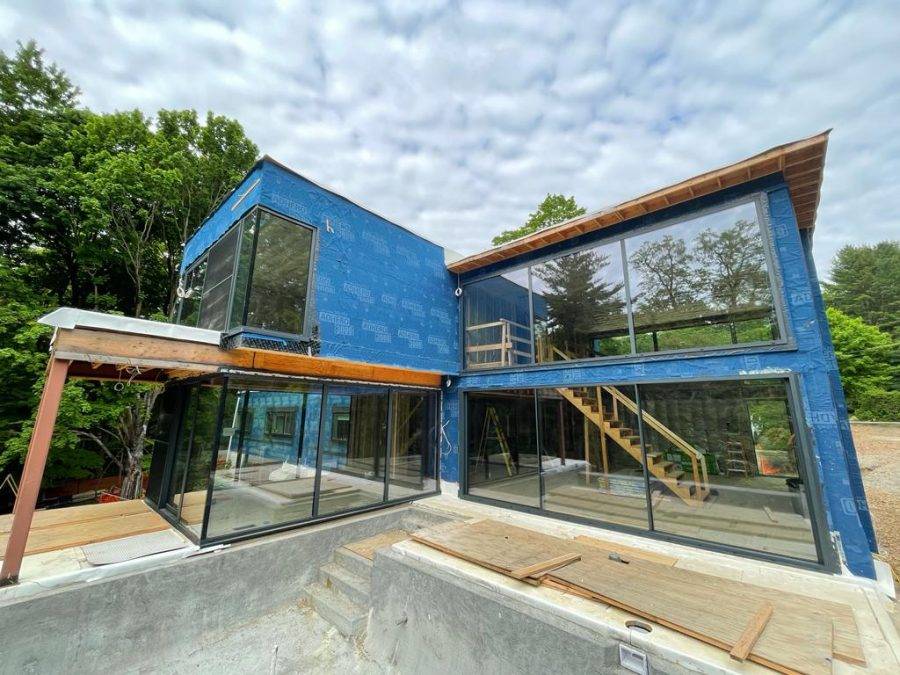 Residential installation of premium aluminum windows and modern lift & slide door systems in Scarsdale, NY.